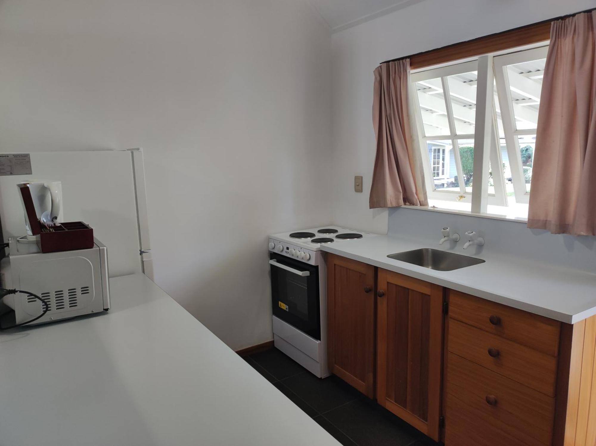 Huka Falls Resort Taupo Ngoại thất bức ảnh A kitchen in a student flat